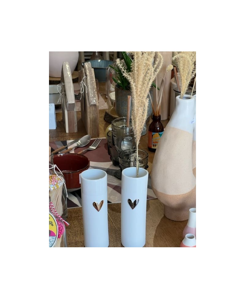 vase en porcelaine blanche avec un décor doré Räder